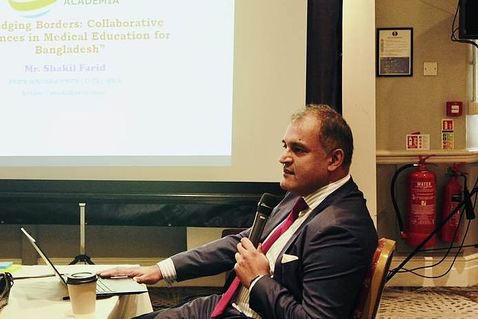 Mr Shakil Farid presenting on medical education for Bangladesh, with the Planetary Health Academia logo